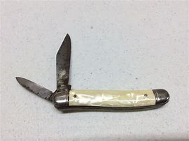 Image result for Pocket Knife with Crown Insignia