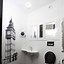 Image result for Black and White Round Design Tiles in Powder Room