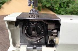 Image result for Adjustable Top Feed Mechanism in Sewing Machine