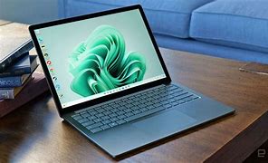 Image result for Microsoft Surface Laptop On a Table
