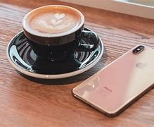 Image result for Gold iPhone XS with Black Case