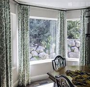 Image result for Hanging Curtains in a Bay Window