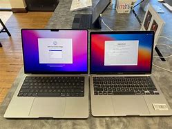 Image result for MacBook Pro 14 Compare to iPhone Pro Max