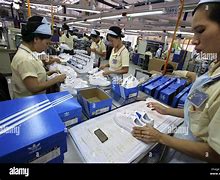 Image result for Adidas Workers Packing Pic