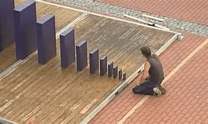 Image result for Domino's Falling Over