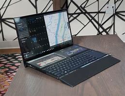 Image result for Dual Screen Laptop with Extra Keyboard