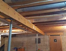 Image result for Triple 2X10 Beam Construction