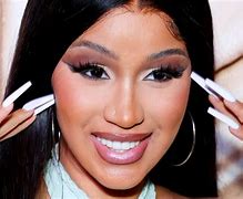 Image result for Cardi B Flower Tattoo