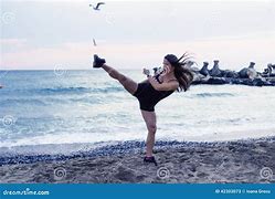 Image result for Woman Martial Arts Beach