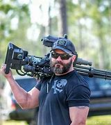 Image result for Guy with Minigun