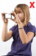 Image result for Hand Holding Phone Camera