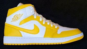 Image result for Yellow and White Jordan's