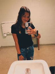 Image result for Girl with Blue Phone Case in Mirror in School Bathroom