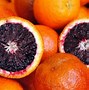 Image result for Fruit with Orange and Red Inside