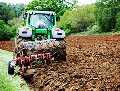 Image result for Tractor Plowing Farmer