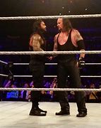 Image result for Roman Reigns vs Undertaker