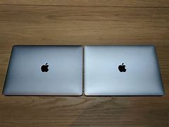 Image result for Silver versus Space Gray MacBook Pro