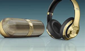 Image result for green and gold headphones