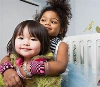 Image result for Diverse Babies Hug a Baby