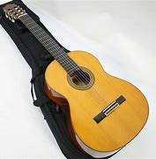 Image result for Yamaha C150 Classical Guitar