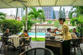 Image result for Min Jiang Goodwood Park Hotel Employee