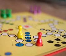 Image result for Photos of People Playing Board Games