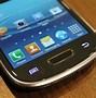 Image result for Galaxy S4 Mini Next to an iPhone 5S