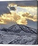 Image result for Sunset Over Snowy Mountains