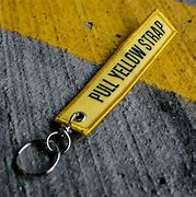 Image result for Tug Yellow Strap Keychain