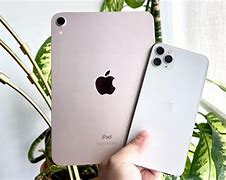 Image result for iPad Mini Size vs iPhone 6s