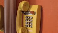 Image result for Yellow Wall Dial Phone