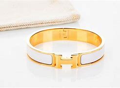 Image result for White and Gold Hermes Bracelet