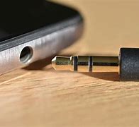 Image result for iPhone Headphones Connect to Battery Port