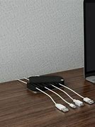Image result for Cord Holders for Electronics