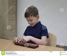 Image result for Kid with Japanese Abacus