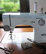 Image result for Oiling an Elna Sewing Machine