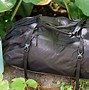 Image result for Duffel with Bottle Holder
