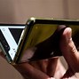 Image result for Samsung Foldind Cell Phone Metal Gold