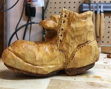Image result for Wood Carved Boots