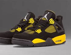 Image result for Yellow and Black Air Jordan 7