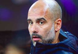 Image result for Man City Fans with Inflatable Pep