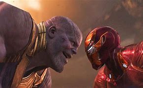 Image result for Iron Man vs Thanos Wallpaper