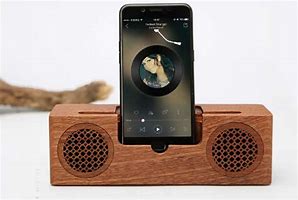 Image result for Phone Stand with Bluetooth Speaker to Watching Games