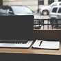 Image result for Apple Laptop in Table