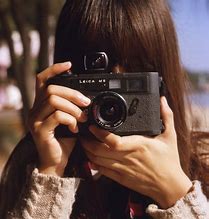 Image result for Girl with Leica Camera