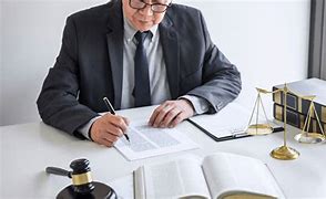 Image result for A Lawyer Preparing a Property Contract