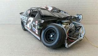 Image result for Damaged NASCAR Diecast