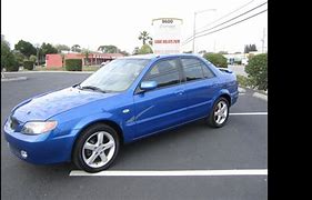 Image result for 2003 Mazda Protoge Gold