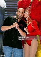 Image result for Las Vegas Race Car Driver Kissed by Showgirl Photo
