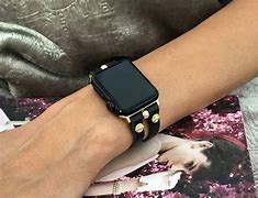 Image result for Black Apple Watch Gold Band
